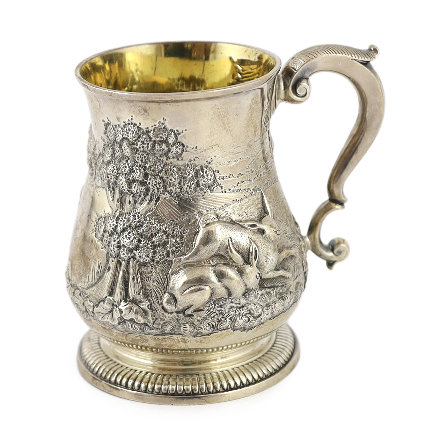 A George II silver baluster mug, by David Willaume II, later decorated with continuous countryside scene with hares and game birds